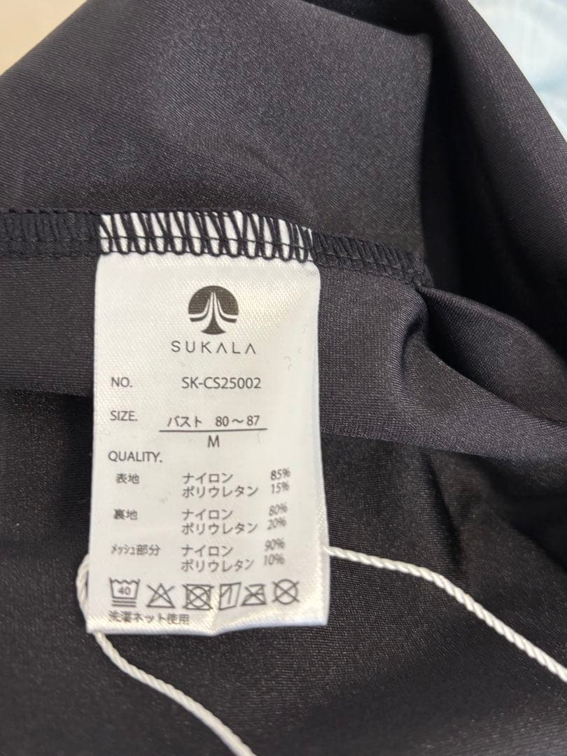 SUKALA シャインストレッチアシンメトリーチュニックM ブラック