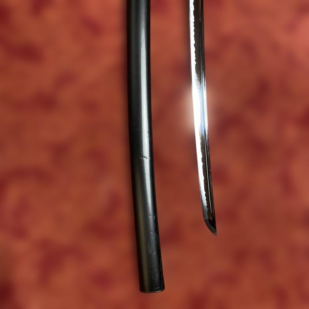 高級居合刀 黒柄 蓮根輪切透し丸鍔 黒呂鞘